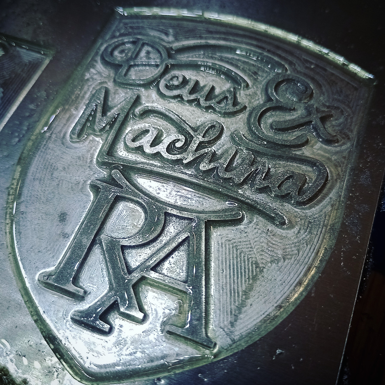 Bespoke personalised scooter fairing badge. Aluminium & resin.
