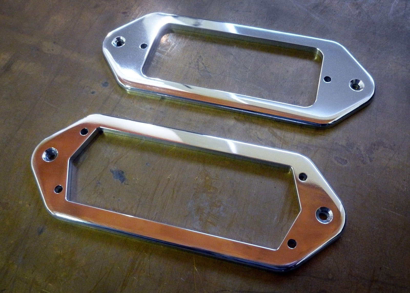 A couple of aluminium pick-up surrounds (Charlie Christian and a mini-humbucker).
