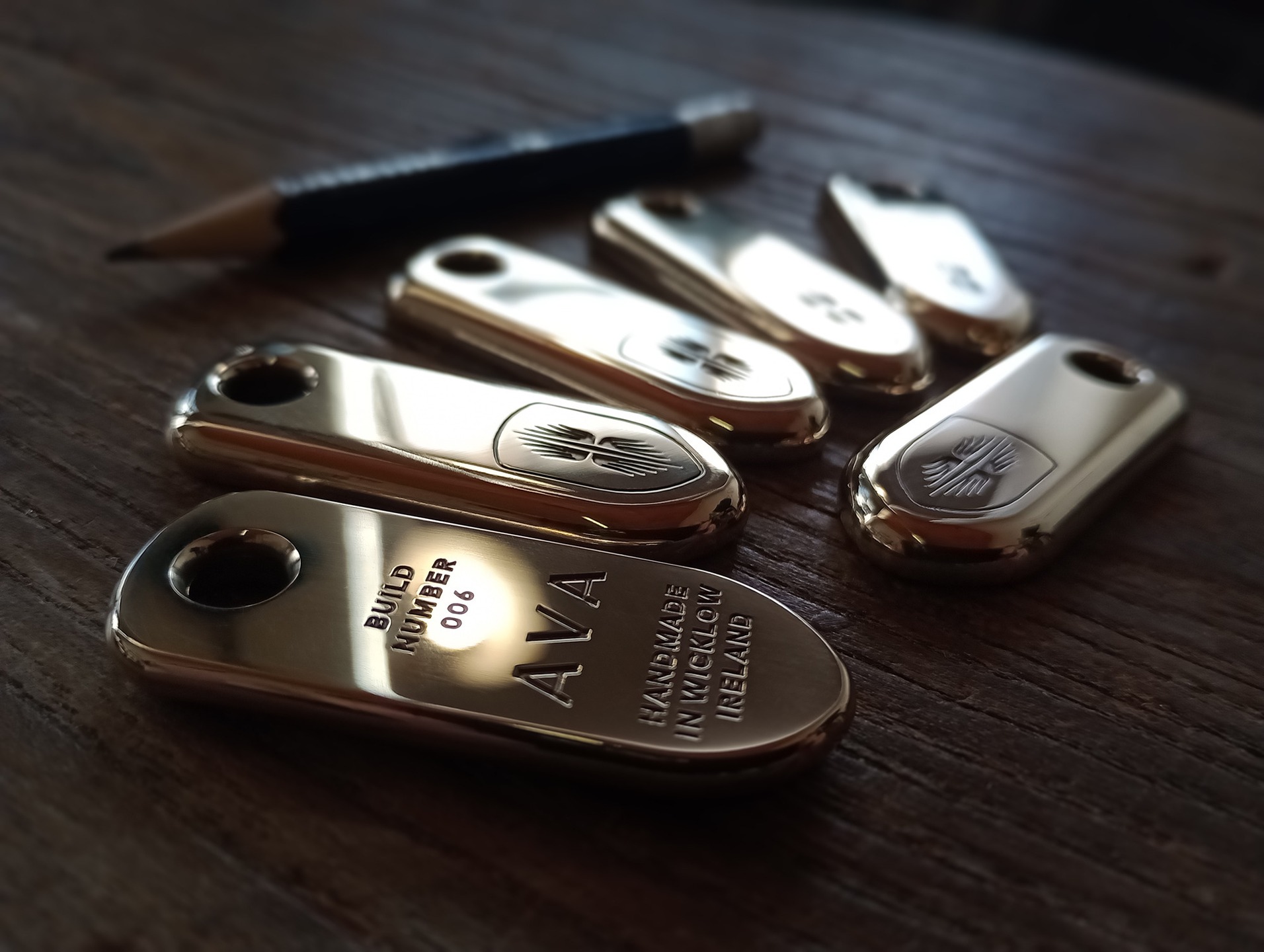 Individually numbered brass key-fobs
