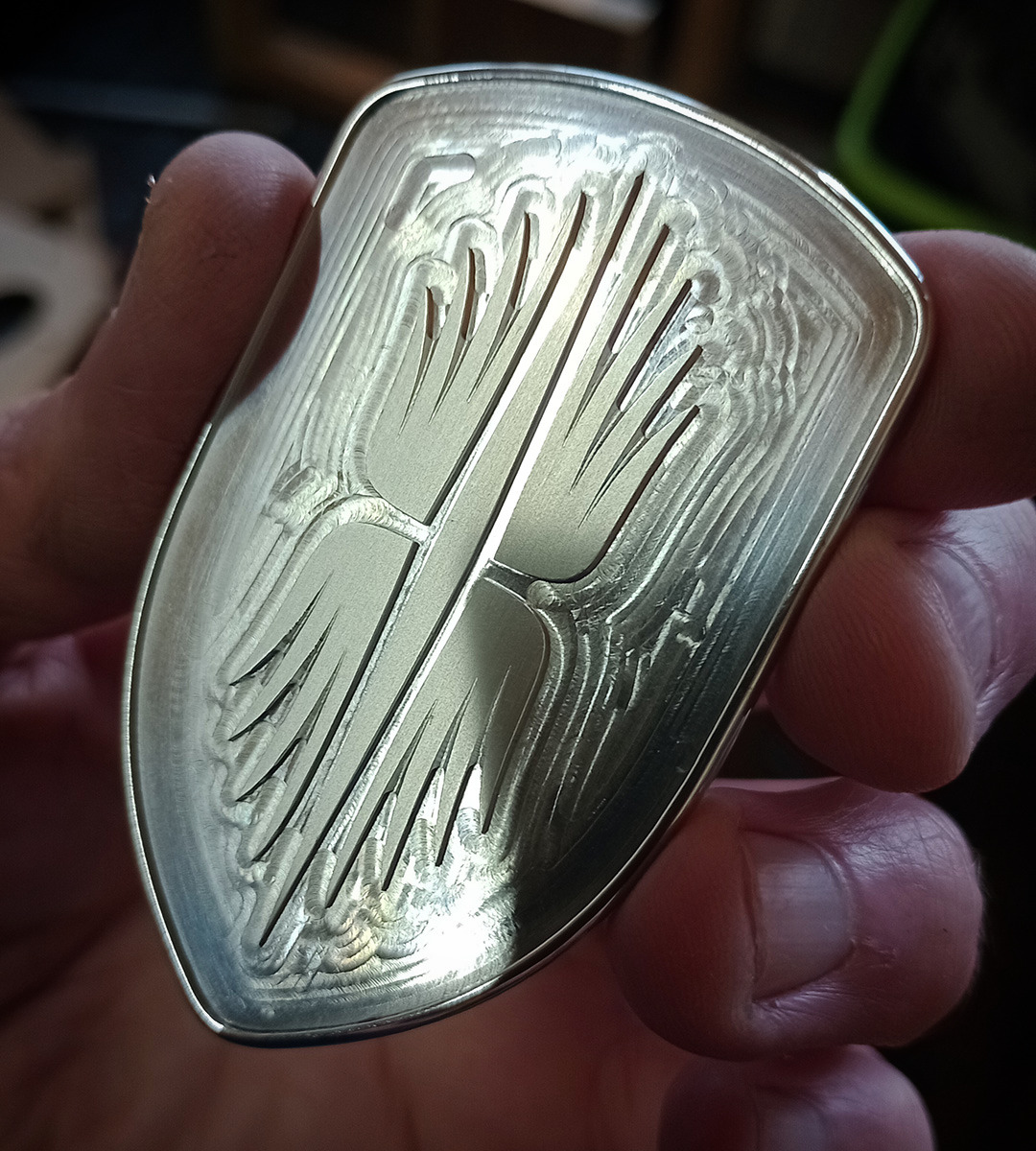 The hood badge prior to any resin being added