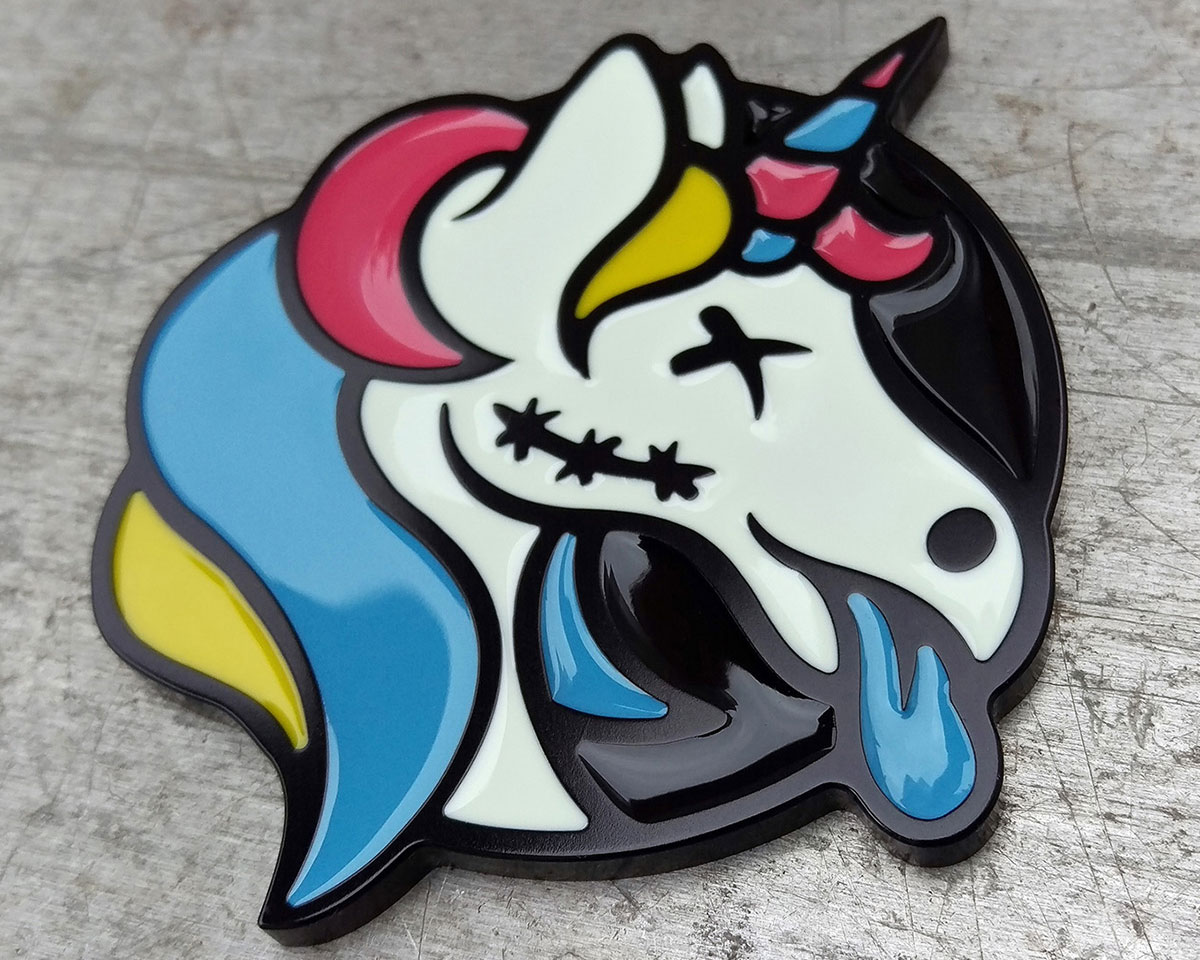 Made as a pair motorcycle fuel tank emblems for a customer out in Canada.  Machined out of 7075T6 aluminium, anodised black and in-filled with epoxy resin paint.