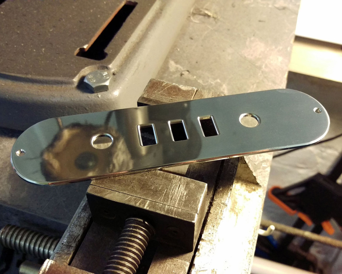 Polished aluminium control plate for a custom Telecaster guitar.